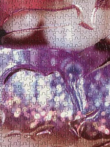 ARTXPUZZLES - Artist Marilyn Minter Title: Wet Kiss Jigsaw Puzzle Size: 19.25" x 28" 1000 Jigsaw Puzzle Pieces, ESKA Premium Board, Gloss Finish.